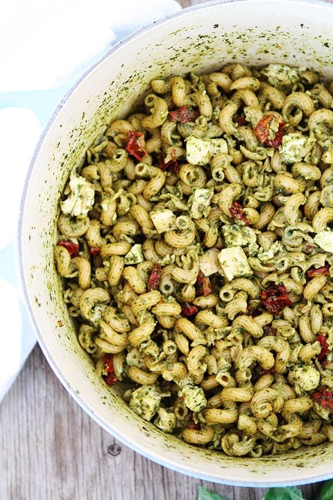 Pesto Chicken Pasta with Sun-Dried Tomatoes Recipe on twopeasandtheirpod.com #recipe Pesto Chicken Pasta with Sun-Dried Tomatoes Recipe on twopeasandtheirpod.com #recipe