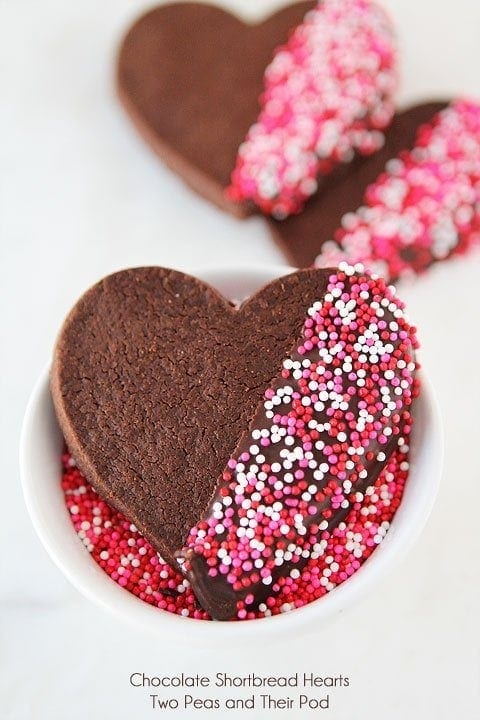 Chocolate Shortbread Cookies Chocolate Shortbread Heart Cookies on twopeasandtheirpod.com Dipped in chocolate too!