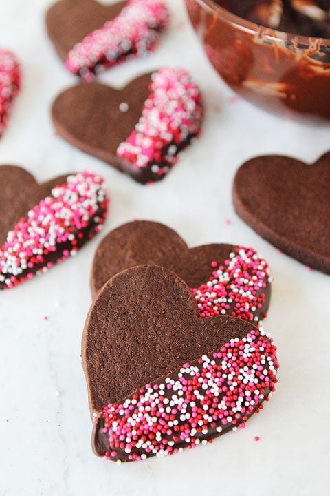 Chocolate-Dipped Shortbread Cookie Recipe Chocolate Shortbread Heart Cookies on twopeasandtheirpod.com Chocolate cookies dipped in chocolate? YES!