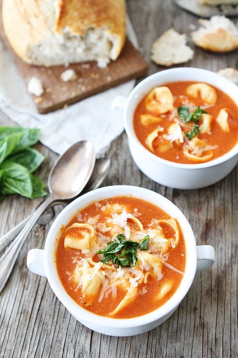 Creamy Tomato Tortellini Soup Recipe on twopeasandtheirpod.com Love this easy and delicious soup! Tortellini Soup serve with crusty bread