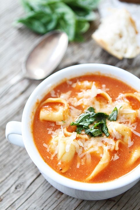 Creamy Tomato Tortellini Soup Recipe on twopeasandtheirpod.com Simple to make and SO good! creamy tortellini soup made with Greek yogurt instead of cream