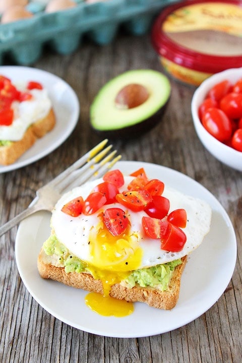 Avocado Toast Recipe Avocado, Hummus, and Egg Toast Recipe on twopeasandtheirpod.com Love this easy and healthy recipe!