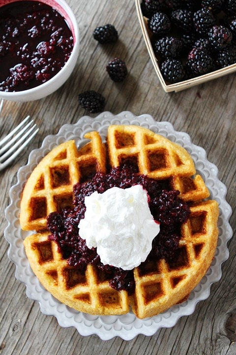 Cornmeal Waffles with Blackberry Compote Recipe Cornmeal Waffles with Blackberry Compote Recipe on twopeasandtheirpod.com. A great way to start any day! This waffle recipe is SO good!