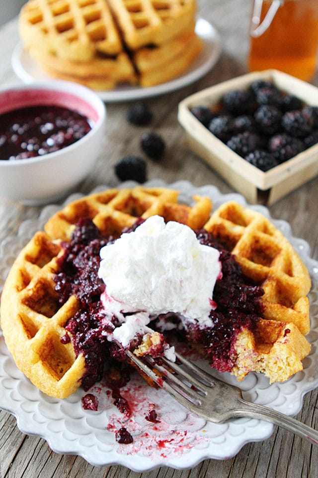 Cornmeal Waffles with Blackberry Compote Recipe Cornmeal Waffles with Blackberry Compote Recipe on twopeasandtheirpod.com. Trust me, you NEED to make these waffles!