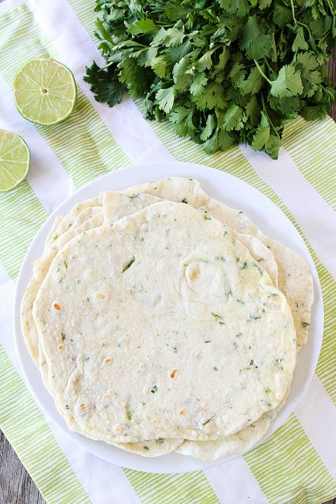 Homemade Flour Tortillas Recipe on twopeasandtheirpod.com Easy to make at home and so good! Homemade tortillas made from Easy tortilla recipe