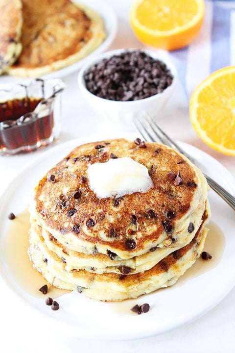 Orange Ricotta Chocolate Chip Pancakes Recipe Orange Ricotta Chocolate Chip Pancakes Recipe on twopeasandtheirpod.com You will want a big stack!