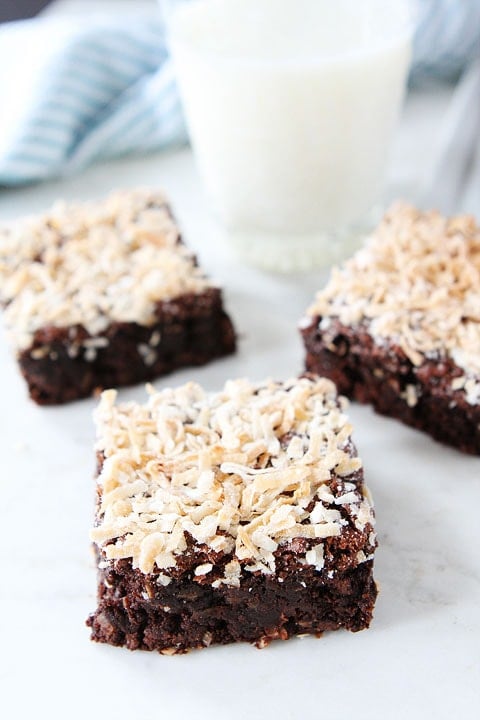 Coconut Brownie Recipe Coconut Brownie Recipe on twopeasandtheirpod.com. Fudgy brownies made with coconut oil and topped with shredded coconut!
