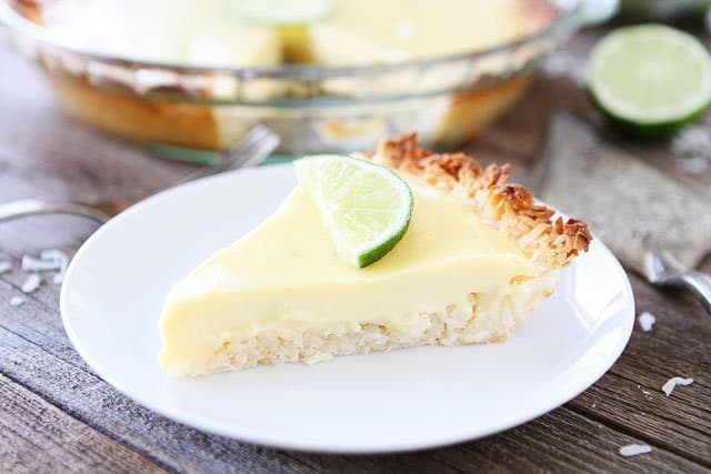 Key Lime Pie with Coconut Macaroon Crust Recipe Key Lime Pie with Coconut Macaroon Crust Recipe on twopeasandtheirpod.com. The coconut macaroon crust make this key lime pie extra special!