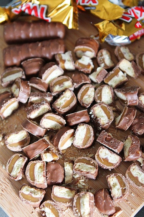 Twix Blondie Recipe Twix Caramel Cookie Bars Recipe on twopeasandtheirpod.com. #recipe #dessert
