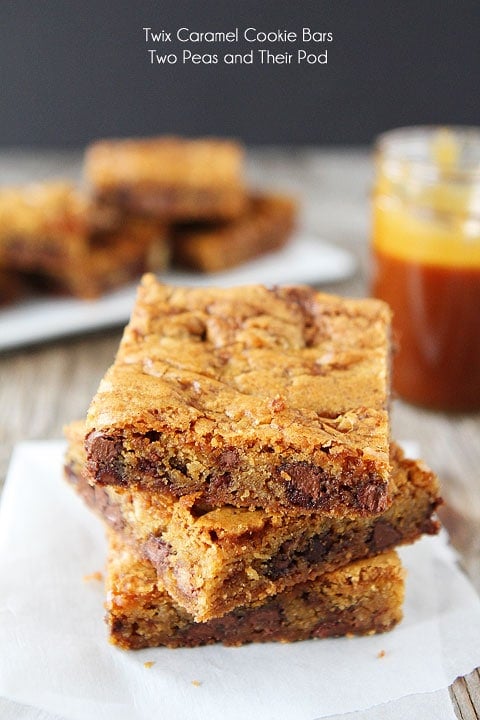 Twix Caramel Cookie Bars Recipe Twix Caramel Cookie Bars Recipe on twopeasandtheirpod.com. Cookie bars with Twix candy bars, caramel, and a sprinkle of sea salt! YUM!