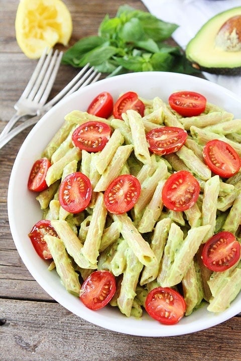 Avocado Goat Cheese Pasta Recipe on twopeasandtheirpod.com This simple pasta dish is creamy and full of flavor thanks to the avocado and goat cheese. It is one of our favorite weeknight meals. Avocado Goat Cheese Pasta Recipe