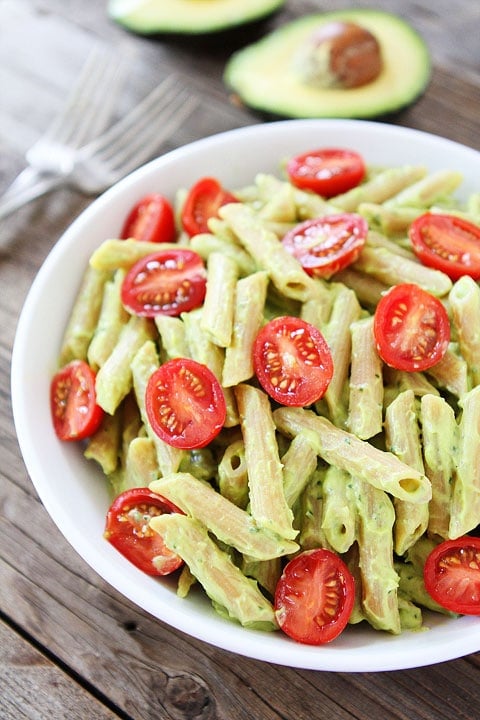 Avocado Goat Cheese Pasta Recipe on twopeasandtheirpod.com This simple and creamy pasta dish is full of flavor and can be made in under 30 minutes! Avocado Goat Cheese Pasta Recipe