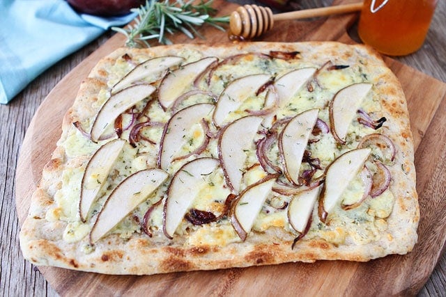 Pear and Blue Cheese Flatbread Recipe Pear and Blue Cheese Flatbread Recipe on twopeasandtheirpod.com. This quick and easy flatbread only takes 20 minutes to make!