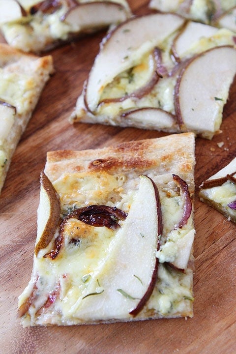 Pear and Blue Cheese Flatbread Recipe Pear and Blue Cheese Flatbread Recipe on twopeasandtheirpod.com. This gourmet flatbread only takes 20 minutes to make!