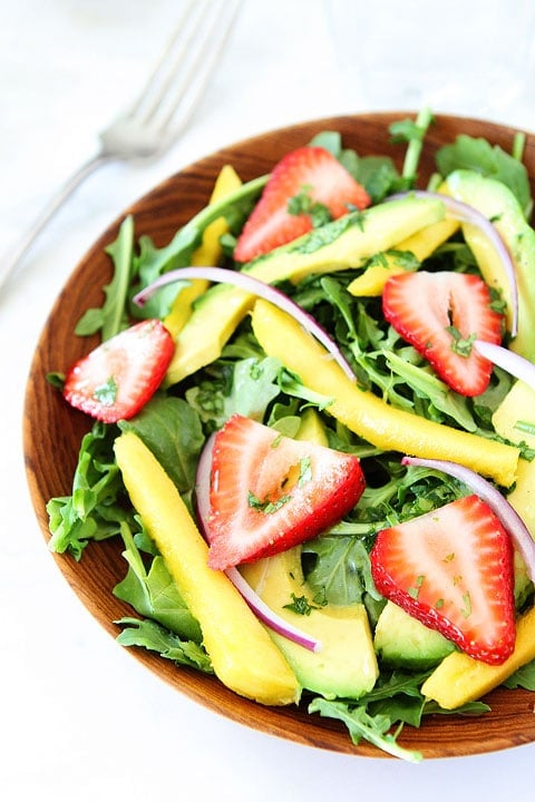 Mango, Strawberry, and Avocado Arugula Salad Recipe Mango, Strawberry, and Avocado Arugula Salad Recipe on twopeasandtheirpod.com. Love this gorgeous and simple salad! #salad #glutenfree #vegan
