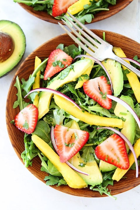 Mango, Strawberry, and Avocado Arugula Salad Recipe Mango, Strawberry, and Avocado Arugula Salad Recipe on twopeasandtheirpod.com. #salad #glutenfree #vegan
