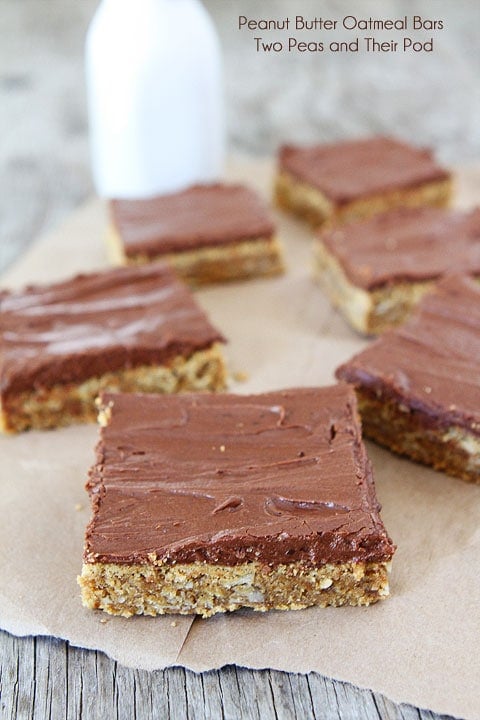 Peanut Butter Oatmeal Bars with Chocolate Frosting Recipe from twopeasandtheirpod.com These bars are easy to make and everyone loves them! They are perfect for parties and potlucks! Peanut Butter Oatmeal Bars with Chocolate Frosting Recipe