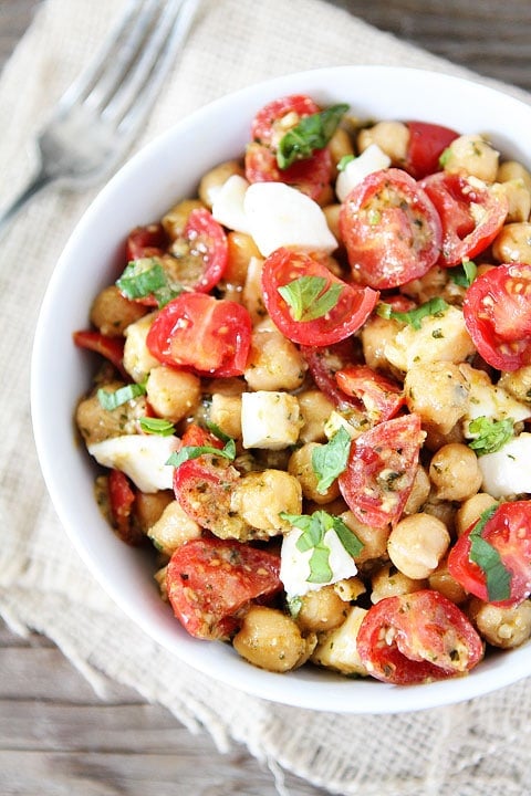 Chickpea, Pesto, Tomato, and Mozzarella Salad Recipe Chickpea, Pesto, Tomato, and Mozzarella Salad Recipe on twopeasandtheirpod.com Only 4 ingredients needed to make this healthy salad!