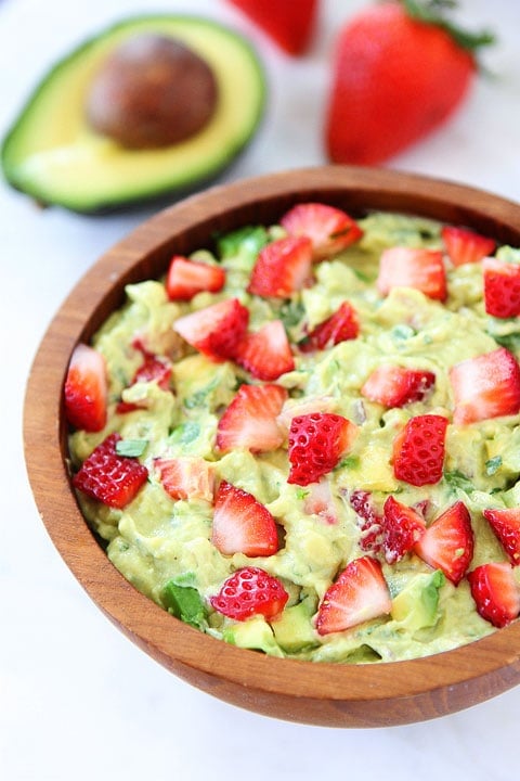 Strawberry Goat Cheese Guacamole Strawberry Goat Cheese Guacamole Recipe on twopeasandtheirpod.com. Love this creamy and fruity guacamole! #avocado #appetizer #guacamole