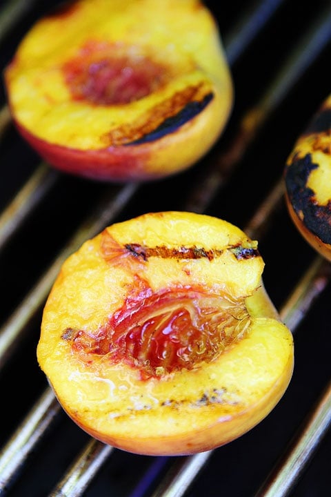 Grilled Peach, Blueberry, and Goat Cheese Arugula Salad Recipe Grilled Peach, Blueberry, and Goat Cheese Arugula Salad on twopeasandtheirpod.com