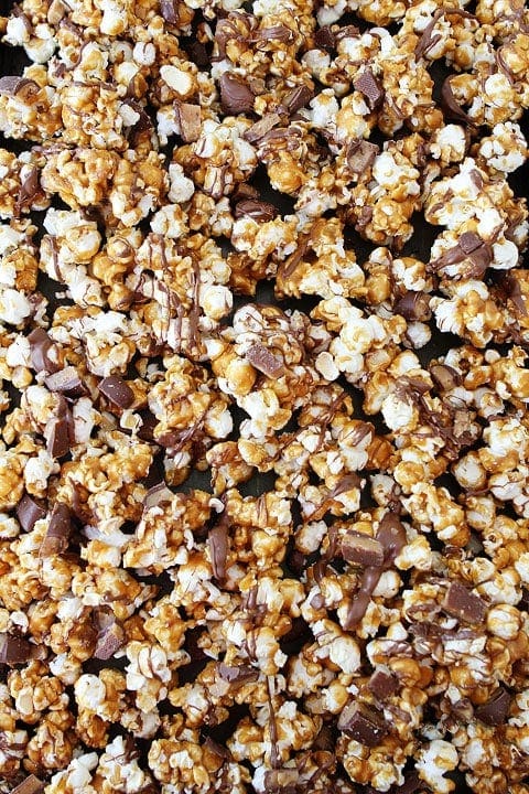Butter Toffee Heath Popcorn Recipe on twopeasandtheirpod.com We LOVE this sweet popcorn! Beware, it is addicting! Butter Toffee Heath Popcorn Recipe on twopeasandtheirpod.com