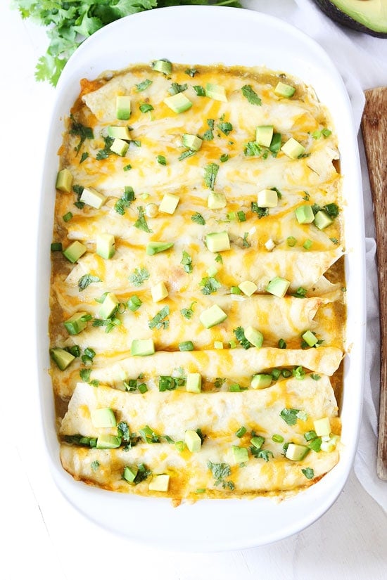 Creamy Spinach and Cheese Green Chile Enchiladas Recipe Creamy Spinach and Cheese Green Chile Enchiladas Recipe on twopeasandtheirpod.com We love these easy enchiladas and they freeze well too!