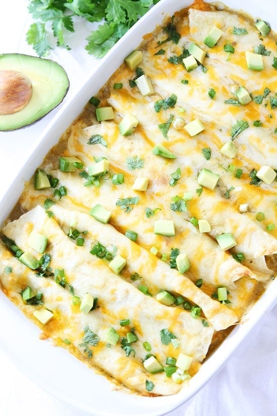 Creamy Spinach and Cheese Green Chile Enchiladas Recipe Creamy Spinach and Cheese Green Chile Enchiladas Recipe on twopeasandtheirpod.com We love these easy enchiladas and they freeze well too! #vegetarian #dinner