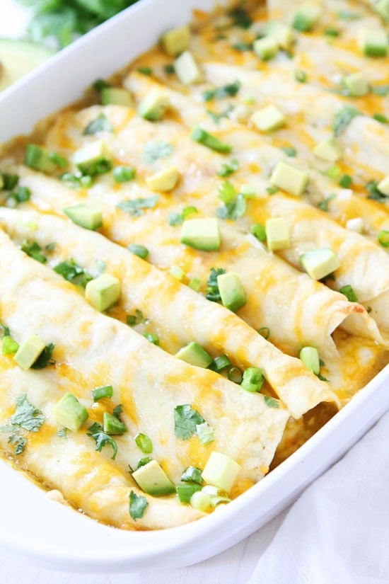 Creamy Spinach and Cheese Green Chile Enchiladas Recipe Creamy Spinach and Cheese Green Chile Enchiladas Recipe on twopeasandtheirpod.com Great for dinner recipe and they freeze well too!