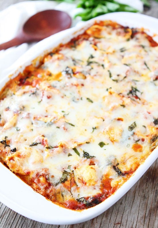 Easy Cheesy Baked Tortellini Recipe on twopeasandtheirpod.com Love this easy baked pasta dish! #pasta #dinner #vegetarian Easy Cheesy Baked Tortellini Recipe