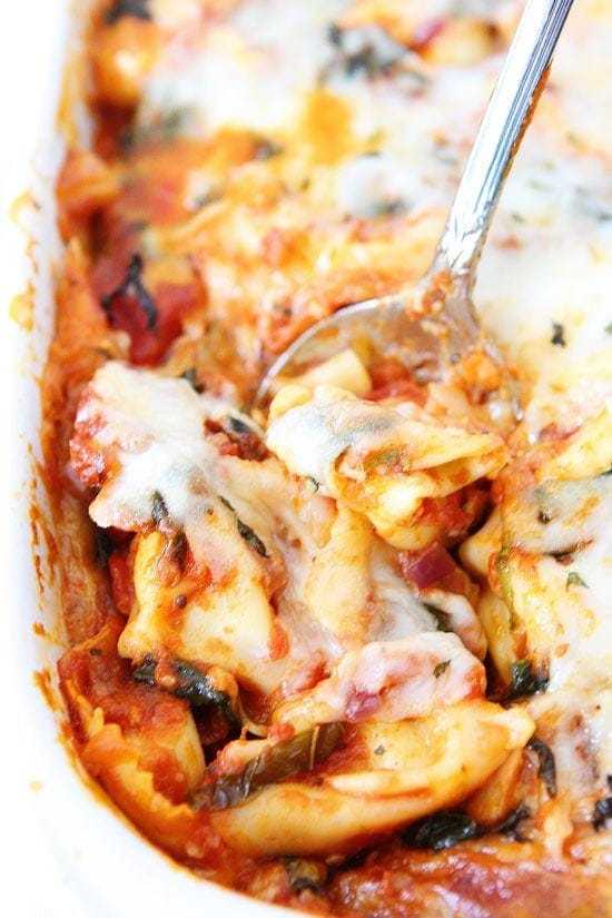 Easy Cheesy Baked Tortellini Recipe on twopeasandtheirpod.com Everyone loves this recipe! Great for weeknight dinners or entertaining! Easy Cheesy Baked Tortellini Recipe