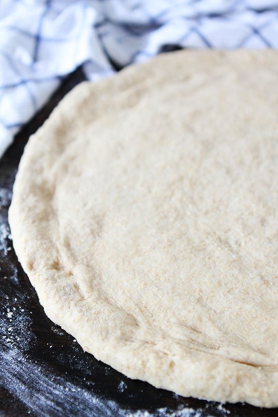 Easy Whole Wheat Pizza Dough Recipe on twopeasandtheirpod.com Easy Whole Wheat Pizza Dough Recipe on twopeasandtheirpod.com The BEST whole wheat pizza dough recipe and it's easy too!