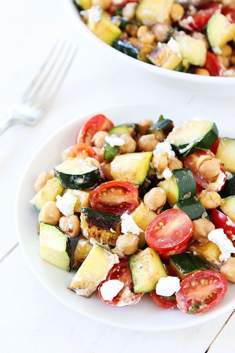 Zucchini Salad Recipe Grilled Zucchini, Chickpea, Tomato, and Goat Cheese Salad Recipe on twopeasandtheirpod.com A great way to use up the summer zucchini!