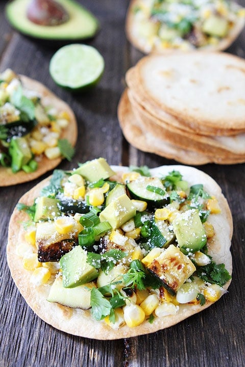 Grilled Zucchini and Corn Tostadas Recipe Grilled Zucchini and Corn Tostadas Recipe on twopeasandtheirpod.com Love this quick and easy dinner recipe! #vegetarian #zucchini