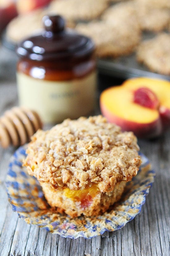 Honey Peach Muffins with Oat Streusel Topping Recipe Honey Peach Muffins with Oat Streusel Topping Recipe on twopeasandtheirpod.com These muffins are a MUST make! #breakfast