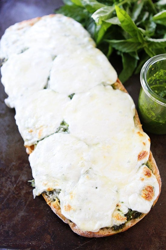 Pesto Cheese Bread Recipe Pesto Cheese Bread Recipe on twopeasandtheirpod.com Love this easy and cheesy bread recipe! #recipe #bread