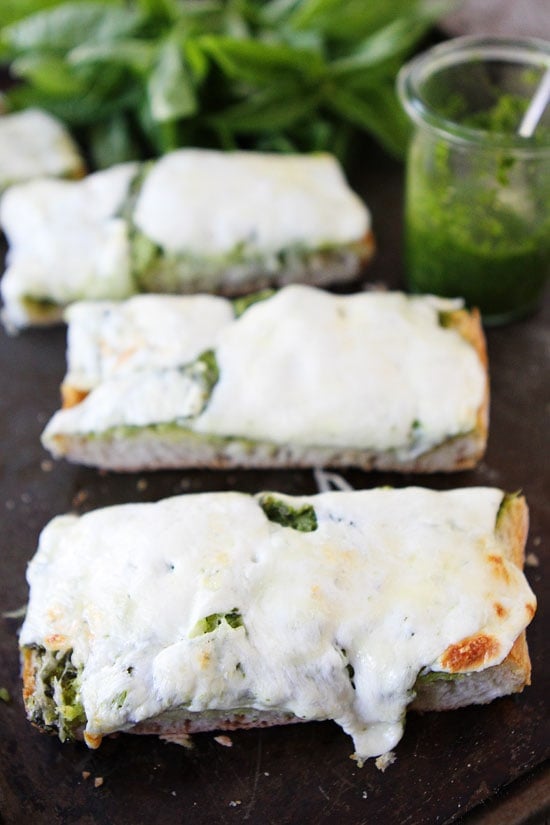 Pesto Cheese Bread Recipe Pesto Cheese Bread Recipe on twopeasandtheirpod.com You only need 4 ingredients to make this cheesy bread! #bread