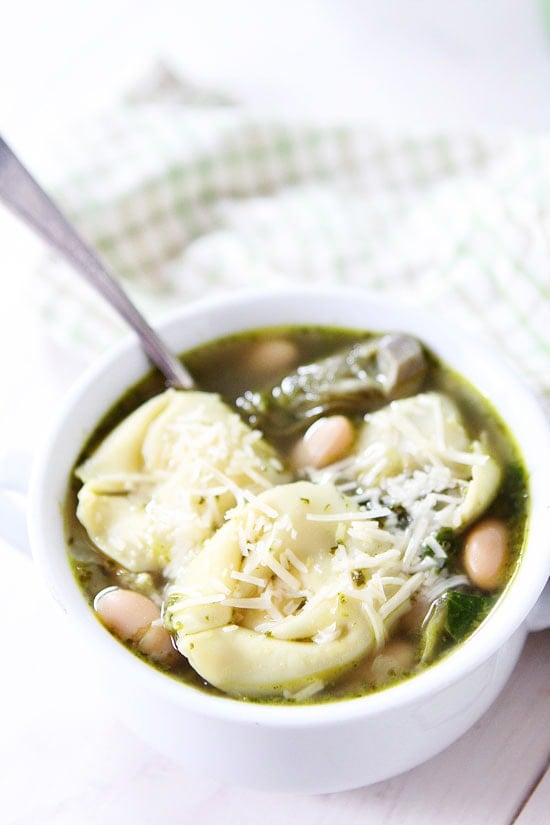 Spinach Artichoke Pesto Tortellini Soup Recipe on twopeasandtheirpod.com Everyone loves this easy tortellini soup recipe! #soup Spinach Artichoke Pesto Tortellini Soup Recipe on twopeasandtheirpod.com