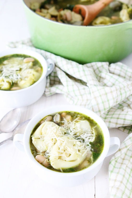 Spinach Artichoke Pesto Tortellini Soup Recipe on twopeasandtheirpod.com This hearty vegetarian soup recipe is a favorite at our house! #soup Spinach Artichoke Pesto Tortellini Soup Recipe on twopeasandtheirpod.com