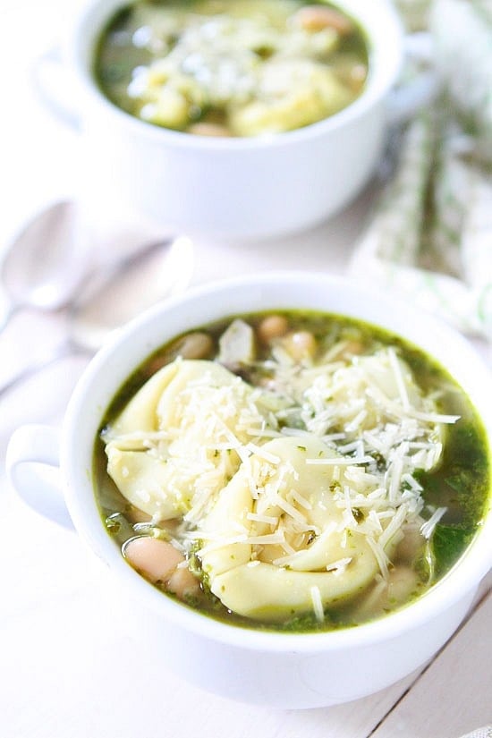 Spinach Artichoke Pesto Tortellini Soup Recipe on twopeasandtheirpod.com Love this simple soup recipe! #soup #vegetarian Spinach Artichoke Pesto Tortellini Soup Recipe on twopeasandtheirpod.com