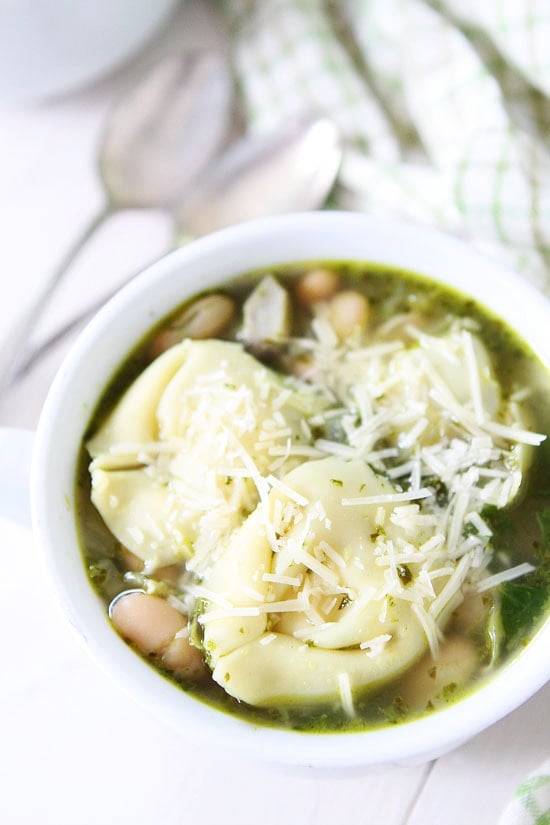 Spinach Artichoke Pesto Tortellini Soup Recipe on twopeasandtheirpod.com This tortellini soup is full of flavor and is so easy to make! #soup #recipe Spinach Artichoke Pesto Tortellini Soup Recipe on twopeasandtheirpod.com This tortellini soup is full of flavor and is so easy to make!
