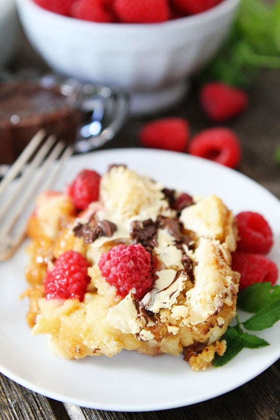 Raspberry Chocolate Bread Pudding Recipe Raspberry Chocolate Bread Pudding Recipe on twopeasandtheirpod.com The perfect holiday dessert!