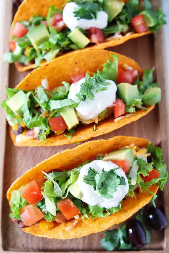 Three Bean Tacos Recipe on twopeasandtheirpod.com You can have these delicious vegetarian tacos on your dinner table in 20 minutes! Three Bean Tacos Recipe on twopeasandtheirpod.com