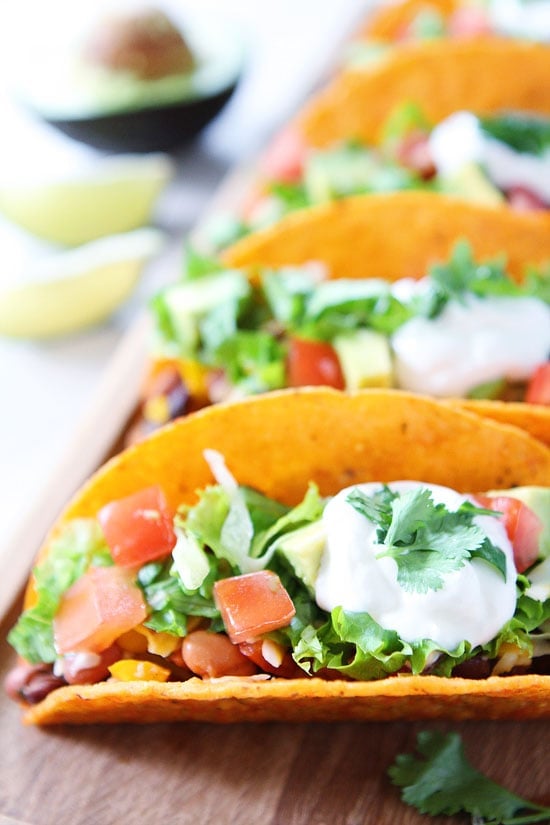 Three Bean Tacos Recipe on twopeasandtheirpod.com You can have these delicious tacos on your dinner table in 20 minutes! #vegetarian #dinner #tacos Three Bean Tacos Recipe on twopeasandtheirpod.com