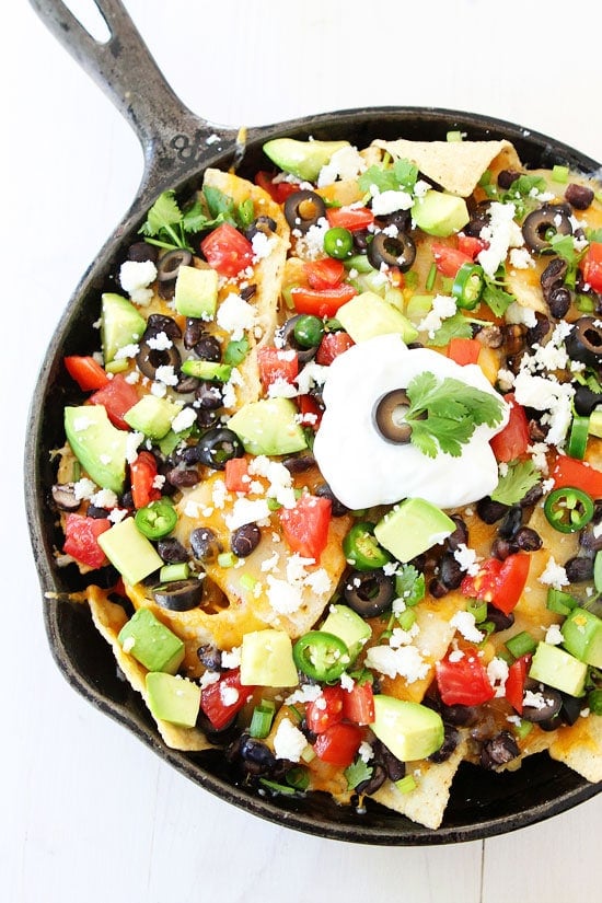 Three Cheese Skillet Nachos Recipe on twopeasandtheirpod.com 