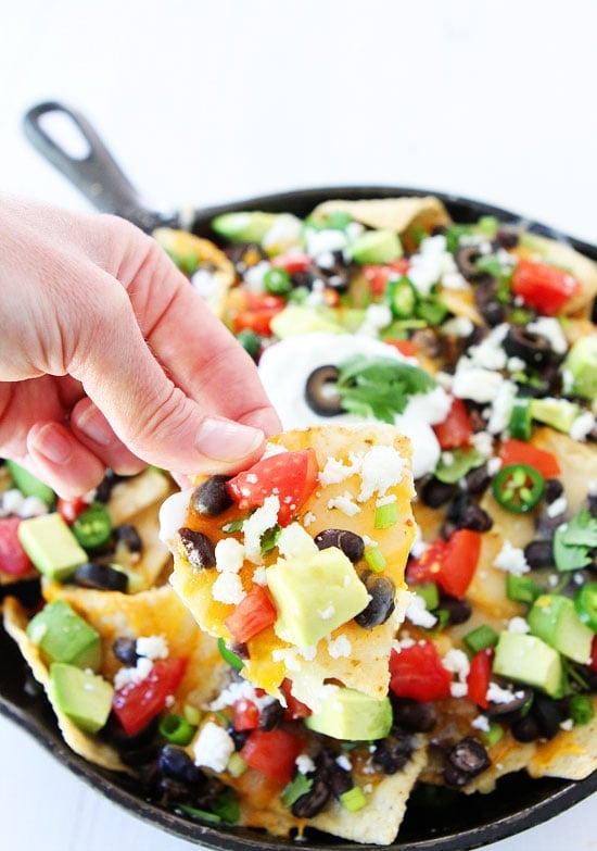 Three Cheese Skillet Nachos Recipe on twopeasandtheirpod.com These cheesy nachos are the perfect game day snack! Three Cheese Skillet Nachos Recipe on twopeasandtheirpod.com