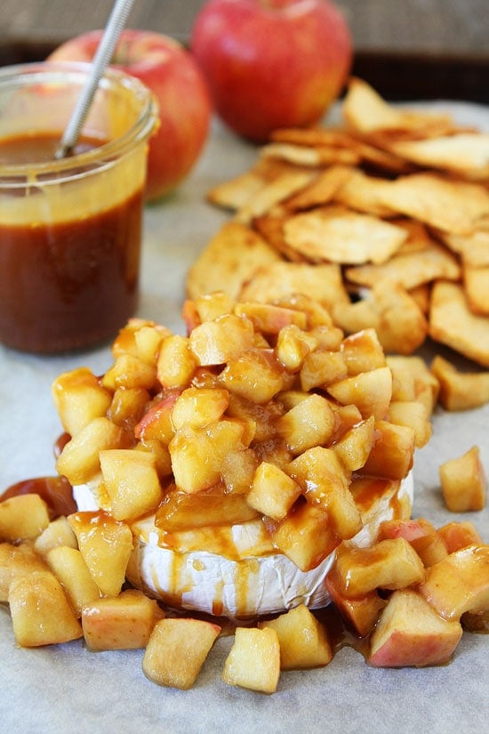 Baked Brie with Apples and Salted Caramel Recipe on twopeasandtheirpod.com You only need 20 minutes to make this amazing appetizer! Baked Brie with Apples and Salted Caramel Recipe on twopeasandtheirpod.com