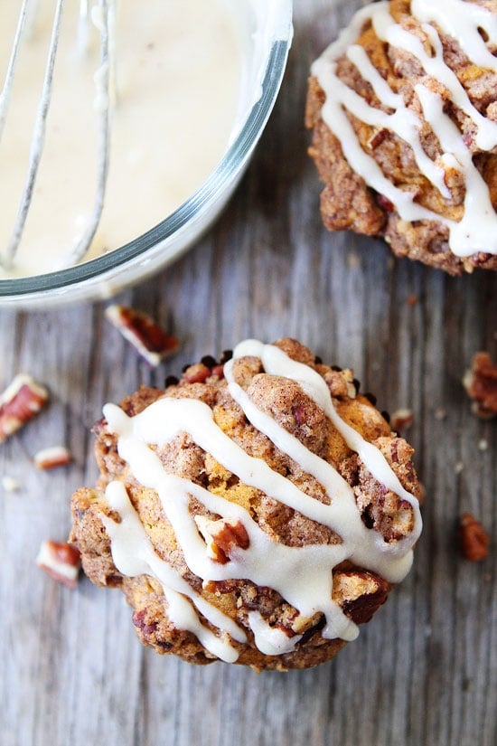Brown Butter Pumpkin Streusel Muffins with Brown Butter Glaze Recipe on twopeasandtheirpod.com The BEST pumpkin muffins! You have to make these! #pumpkin Brown Butter Pumpkin Streusel Muffins with Brown Butter Glaze Recipe