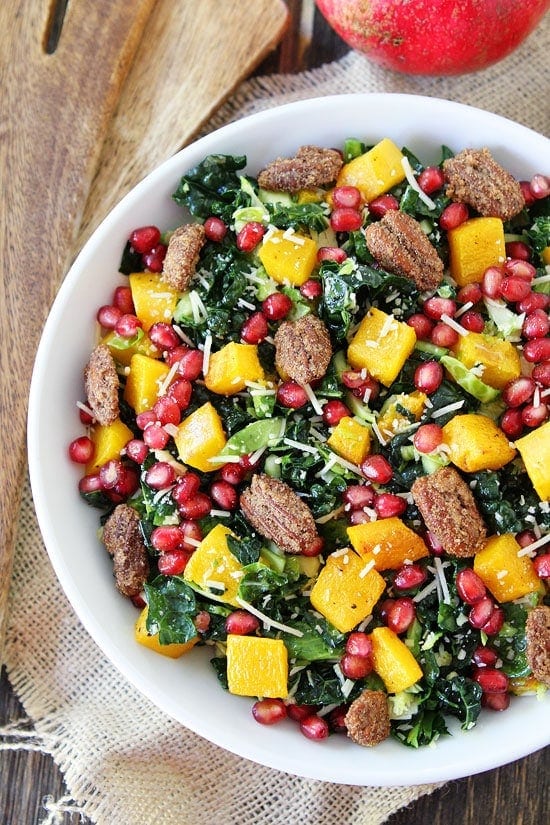 Kale and Brussels Sprouts Salad with Butternut Squash, Pomegranate, and Candied Pecans Recipe on twopeasandtheirpod.com Love this healthy salad! Kale and Brussels Sprouts Salad with Butternut Squash, Pomegranate, and Candied Pecans Recipe