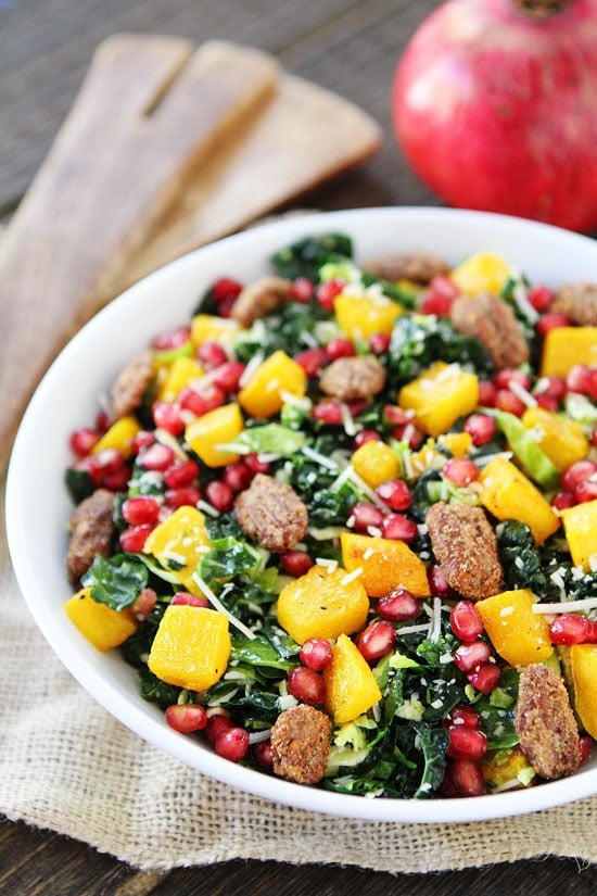 Kale and Brussels Sprouts Salad with Butternut Squash, Pomegranate, and Candied Pecans Recipe on twopeasandtheirpod.com My favorite fall salad! Perfect for the holidays! Kale and Brussels Sprouts Salad with Butternut Squash, Pomegranate, and Candied Pecans Recipe on twopeasandtheirpod.com