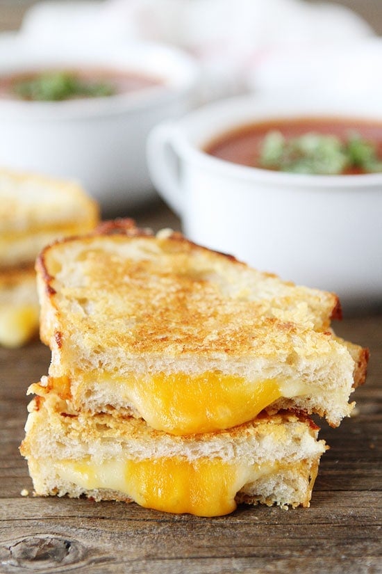 Three Cheese Grilled Cheese Recipe on twopeasandtheirpod.com This sandwich is loaded with cheese and even has a Parmesan cheese crust! SO good! Three Cheese Grilled Cheese Recipe on twopeasandtheirpod.com